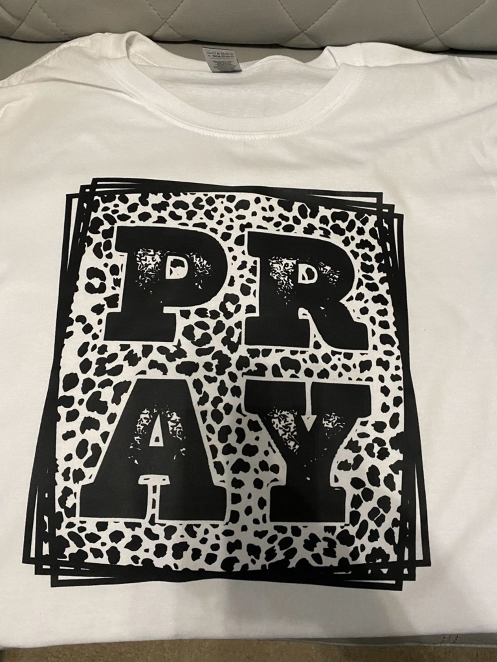 White Graphic Tee with 'PRAY' Leopard Box Print